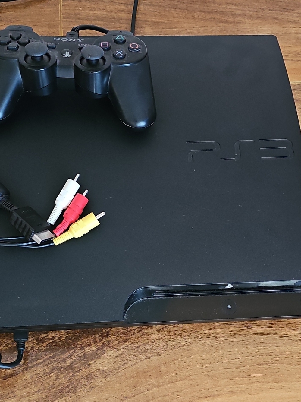 Sony PS3 Slim Console with Black Controller and AV Cables